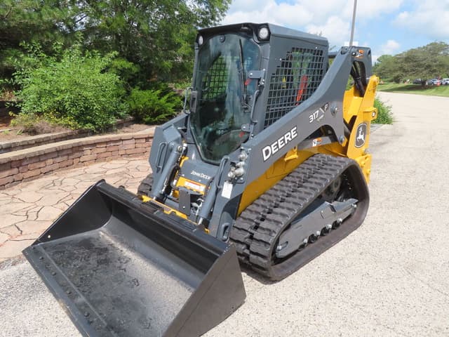 Image of John Deere 317P equipment image 1