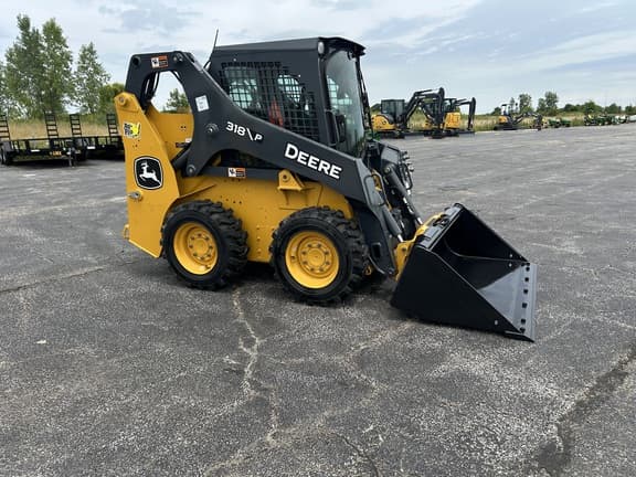 Image of John Deere 318P equipment image 4