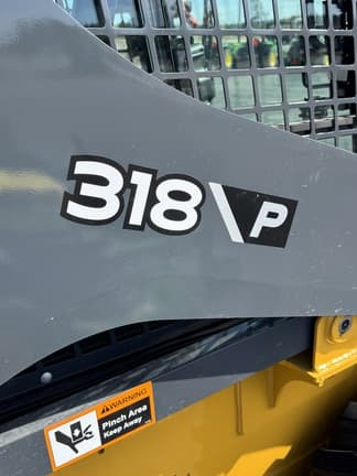 Image of John Deere 318P equipment image 4