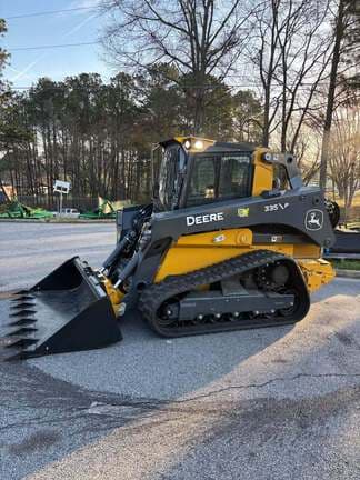 Image of John Deere 335P equipment image 1