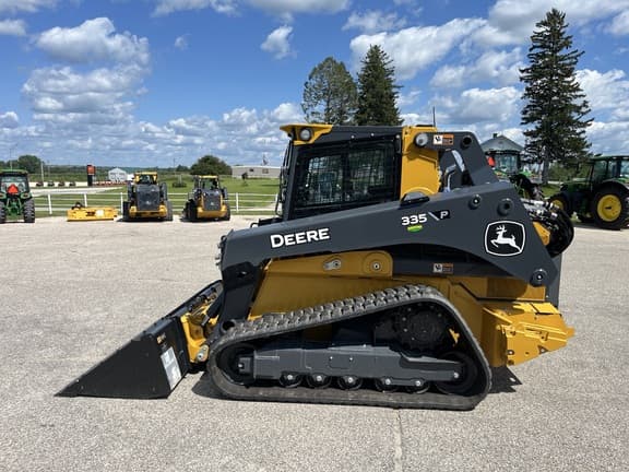 Image of John Deere 335P equipment image 4