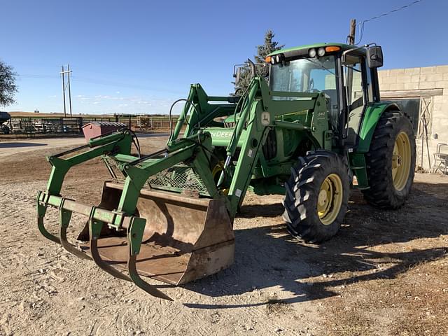 Image of John Deere 6420 equipment image 1