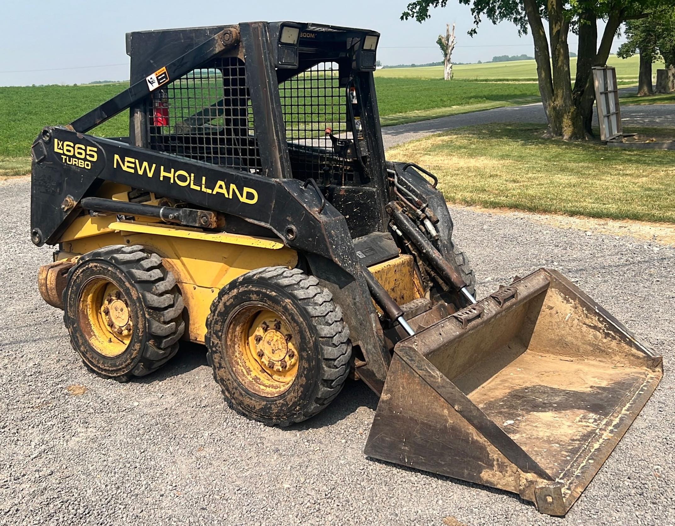 SOLD - 1999 New Holland Lx 665 Skid Steer , diesel , 6496 hrs , 68
