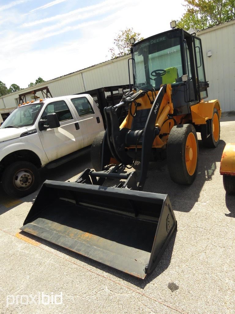 SOLD - John Deere 304J Lot No. 144 Construction with --- Hrs | Tractor Zoom