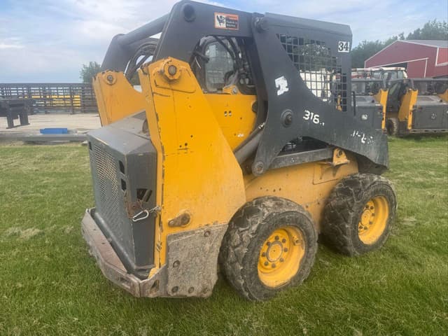 Image of John Deere 318G equipment image 4