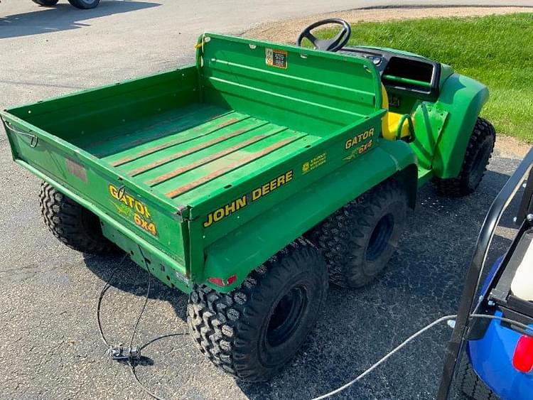 Main image John Deere Gator 6x4 4