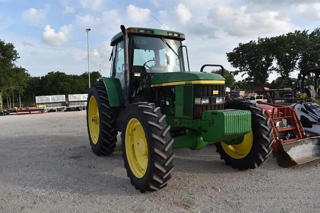 Image of John Deere 7410 equipment image 1