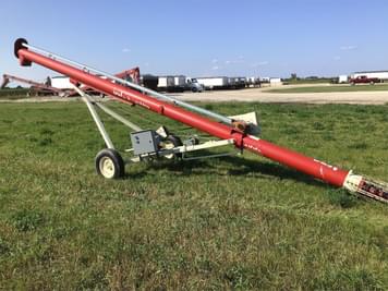 Main image Buhler Farm King 1031