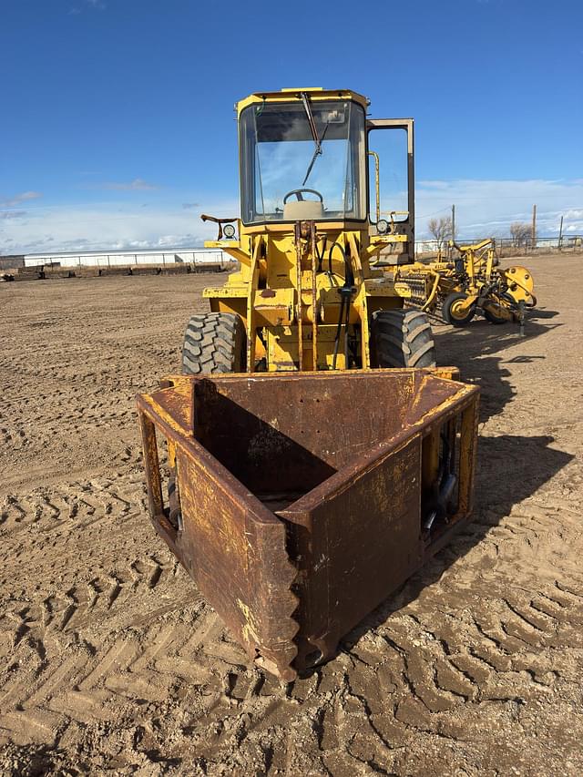 Image of John Deere 244H equipment image 1