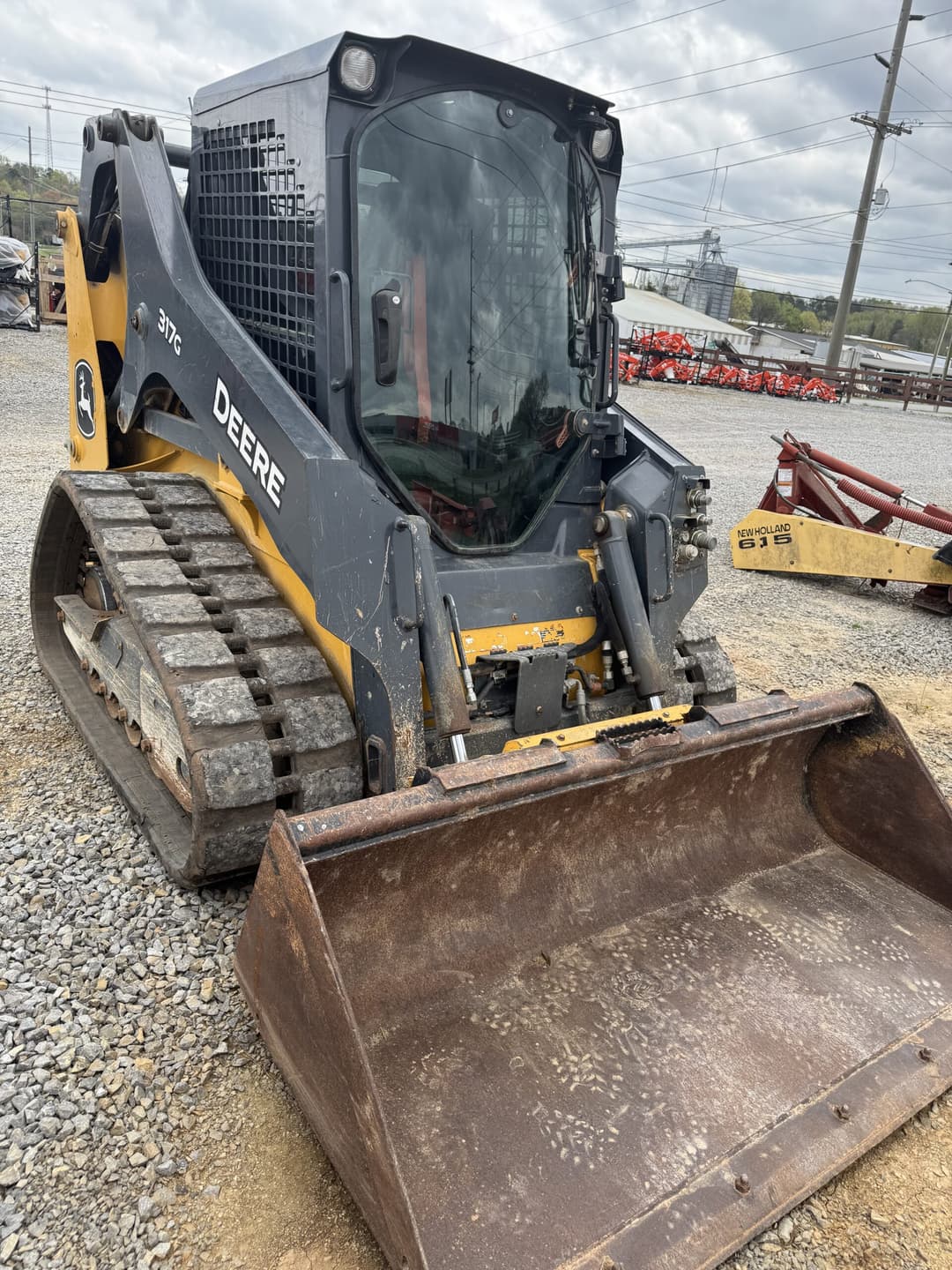 Image of John Deere 317G Image 0