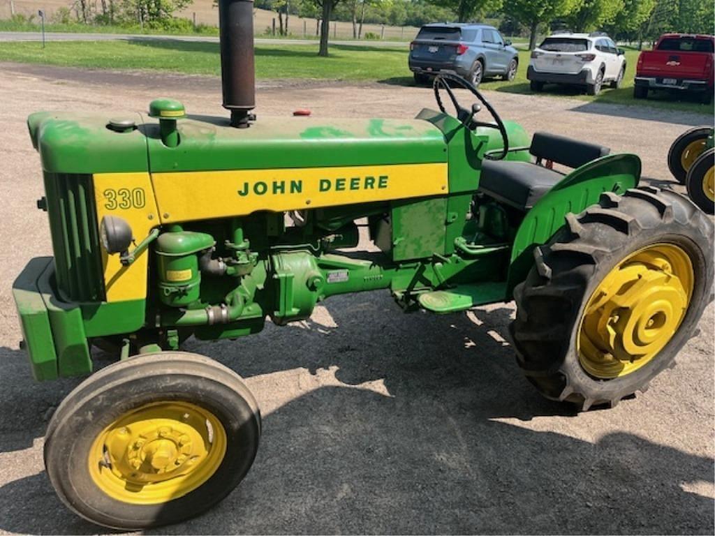 Image of John Deere 330 Image 0