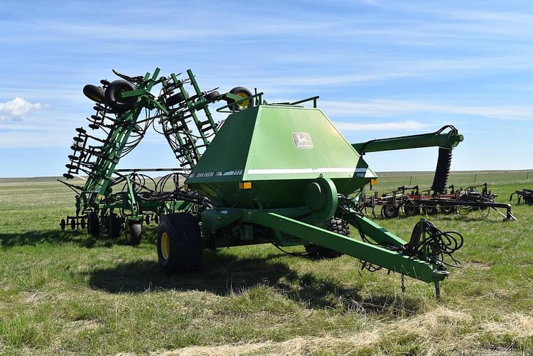 Main image John Deere 777 4