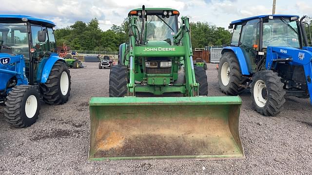 Image of John Deere 6420 equipment image 1