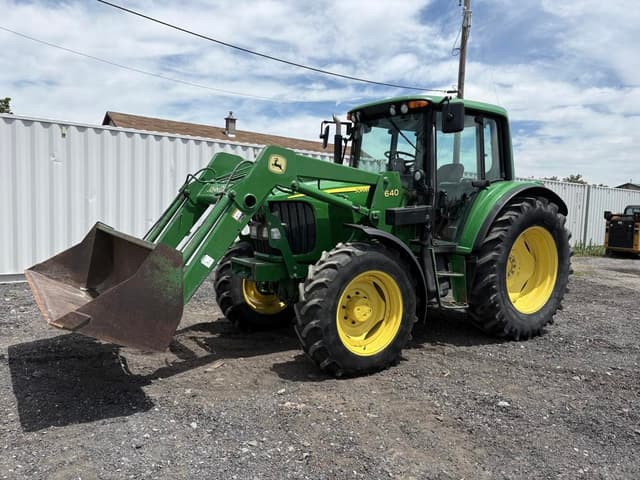 Image of John Deere 6420 equipment image 1