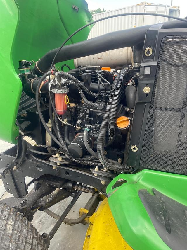 Image of John Deere X595 equipment image 4