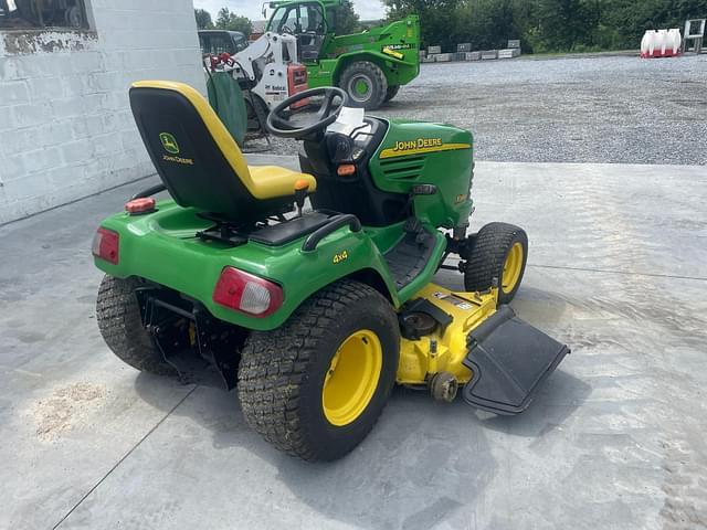 Image of John Deere X595 equipment image 3
