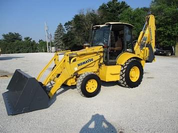 Main image Komatsu WB150PS
