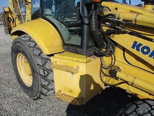 Main image Komatsu WB150PS 17