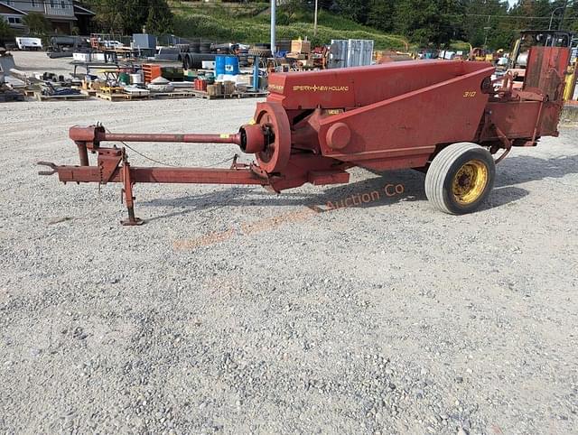 Image of New Holland 310 equipment image 4