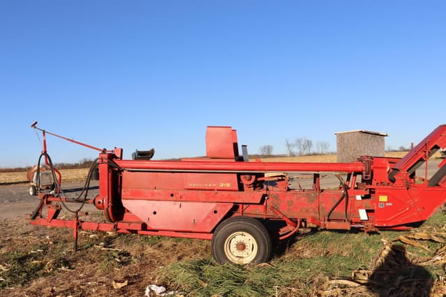 Image of New Holland 315 equipment image 4