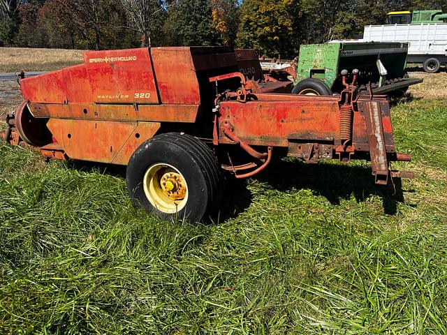 Image of New Holland 320 equipment image 2