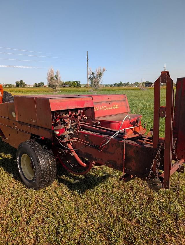 Image of New Holland 320 equipment image 3