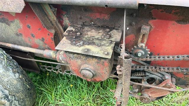 Image of New Holland 325 equipment image 4