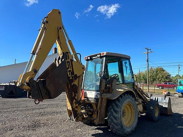 Image of New Holland 555E equipment image 4