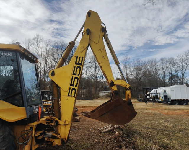 Image of New Holland 555E equipment image 2