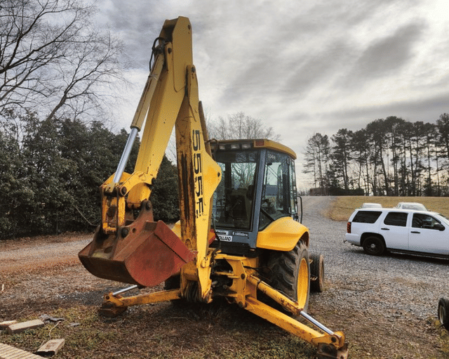 Image of New Holland 555E equipment image 4