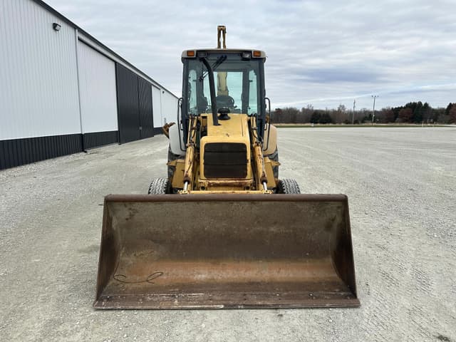 Image of New Holland 555E equipment image 1