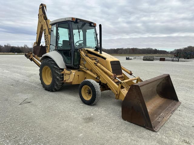 Image of New Holland 555E equipment image 2