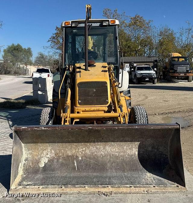 Image of New Holland 555E equipment image 1