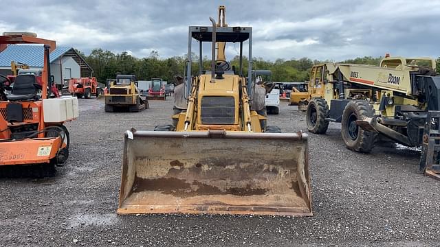 Image of New Holland 555E equipment image 1