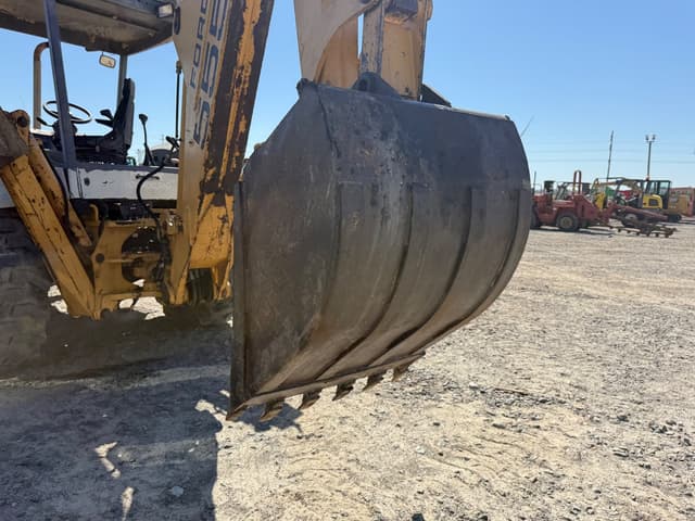 Image of New Holland 555E equipment image 4