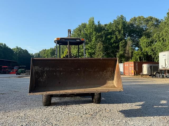 Image of New Holland 555E equipment image 2