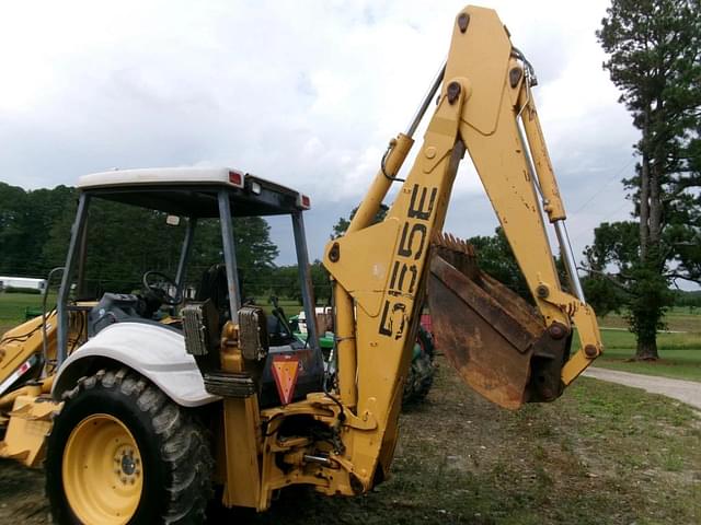 Image of New Holland 555E equipment image 4